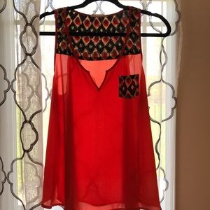 Patterned orange and navy tank top